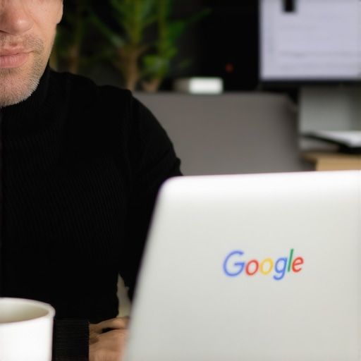 Durham business owner updating Google profile on laptop
